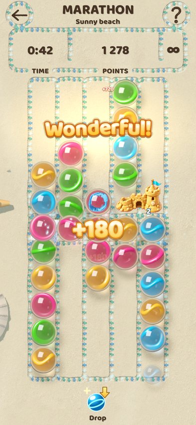 Marathon on the Sunny beach planet: a full board with a sandcastle obstacle and a “Wonderful!” match.